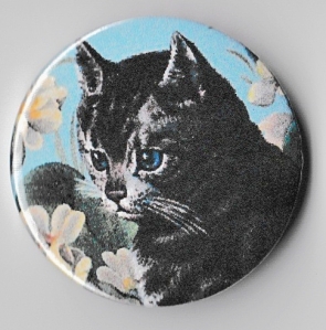 cat in flowers badge